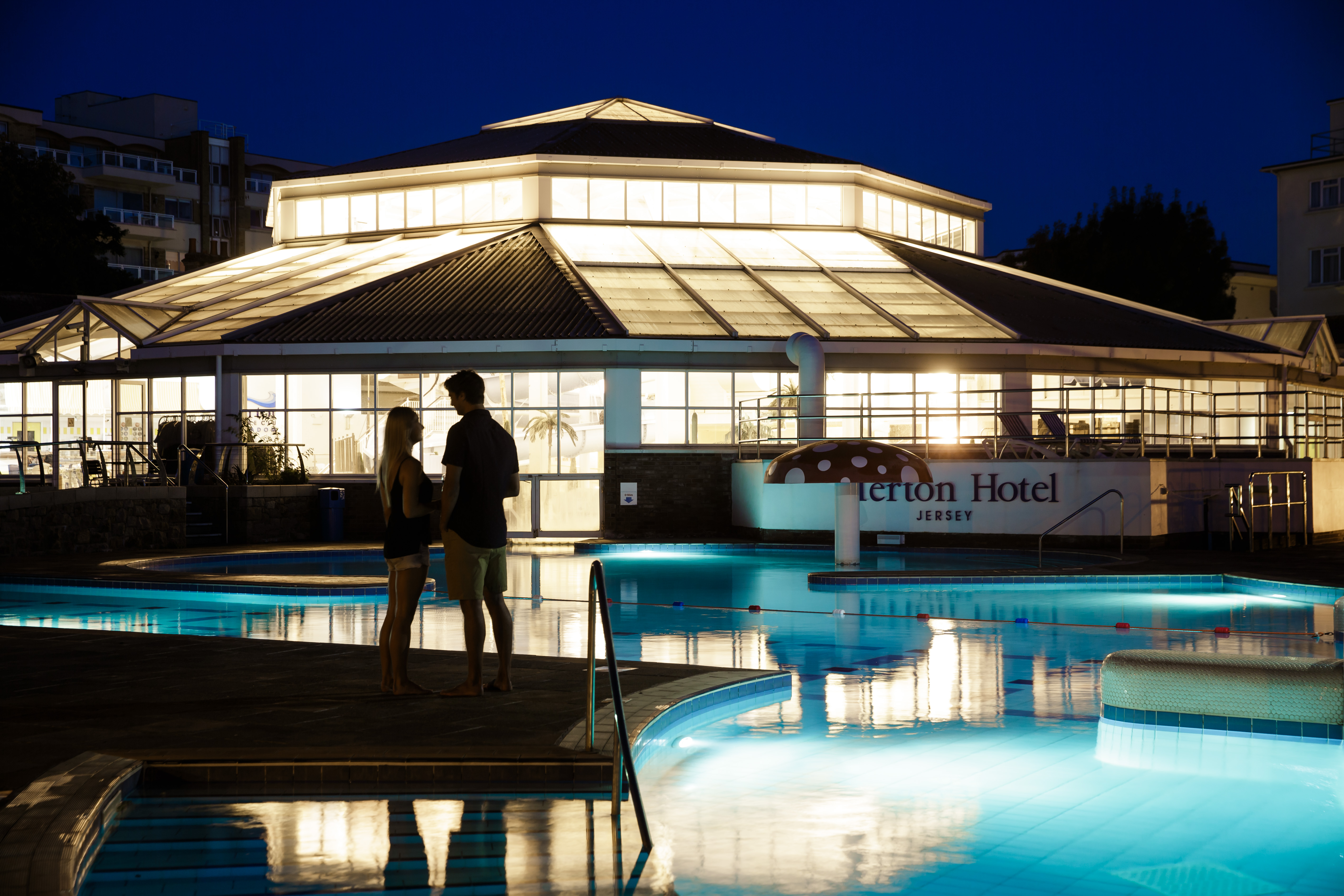 Merton Aquadome. External Dusk Couple
