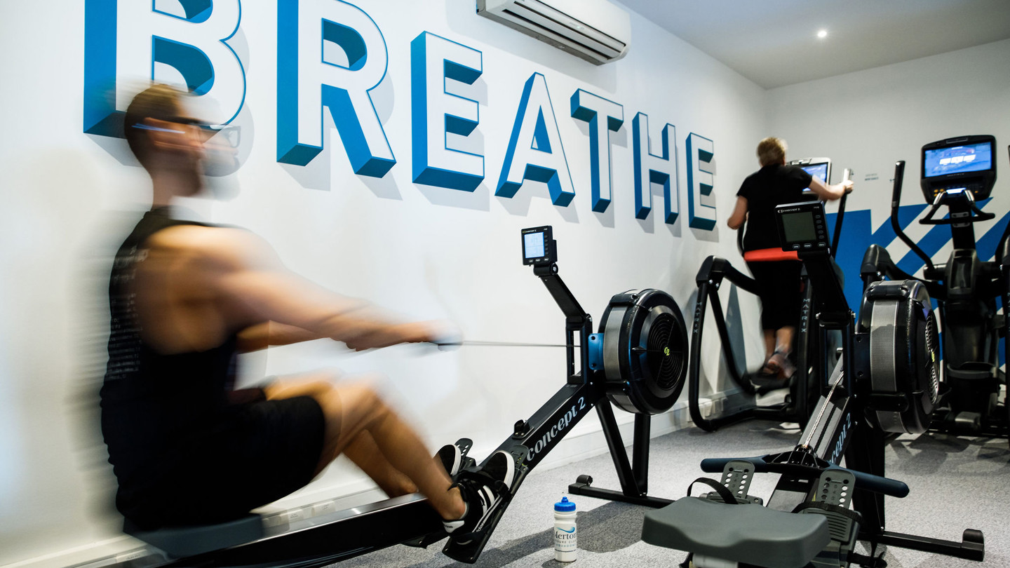 Man om rowing machine at Merton Leisure Club